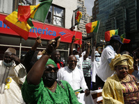 People protest in support of the Senegalese President Macky Sall near the United Nations General Assembly on September 21, 2021 in New York...