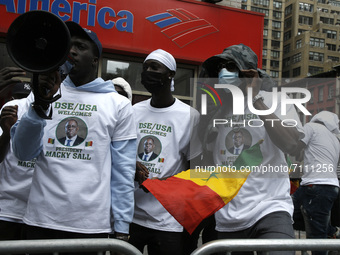 People protest in support of the Senegalese President Macky Sall near the United Nations General Assembly on September 21, 2021 in New York...