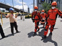 MANILA, Philippines - Filipino mall-goers participate during the metro wide earthquake drill at one of the participating establishments in M...