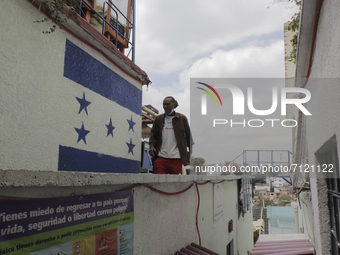 A Haitian migrant on the roof of the Casa Tochán (Our house in Nahuatl) shelter, located on the outskirts of Mexico City, where migrants of...