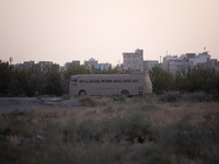 A bus covered by mud as a symbol of the days of war with Iraq in a war exhibition which is held and organized by the Islamic Revolutionary G...