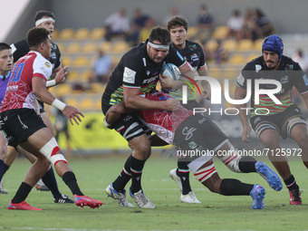 David Sisi (Zebre) is tackled by Vincent Tshituka (Lions) during the United Rugby Championship match Zebre Rugby Club vs Emirates Lions on S...