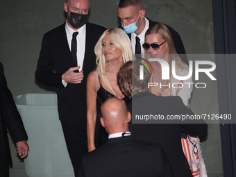 Donatella Versace is seen during the Versace runaway at the Milano Fashion Week 2021/2022, Italy, on September 24 2021 (
