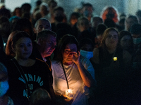 A woman reacts during a vigil for 28 year-old teacher Sabina Nessa, in London, Britain, 24 September 2021. Sabina Nessa, a 28-year-old prima...