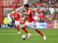 
Brennan Johnson of Nottingham Forest runs with the ball during the Sky Bet Championship match between Nottingham Forest and Millwall at the...