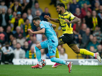 Javier Manquillo of Newcastle and Joshua King of Watford battle for the ball during the Premier League match between Watford and Newcastle U...