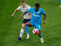 Wendel (R) of Zenit and Denis Yakuba of Krylia Sovetov vie for the ball during the Russian Premier League match between FC Zenit Saint Peter...