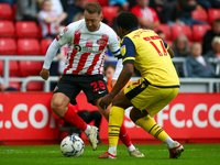 Sunderland's Aiden McGeady takes on Bolton Wanderer's Oladapo Afolayan during the Sky Bet League 1 match between Sunderland and Bolton Wande...