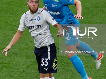 Dmitri Chistyakov (R) of Zenit and Ivan Sergeev of Krylia Sovetov vie for a header during the Russian Premier League match between FC Zenit...