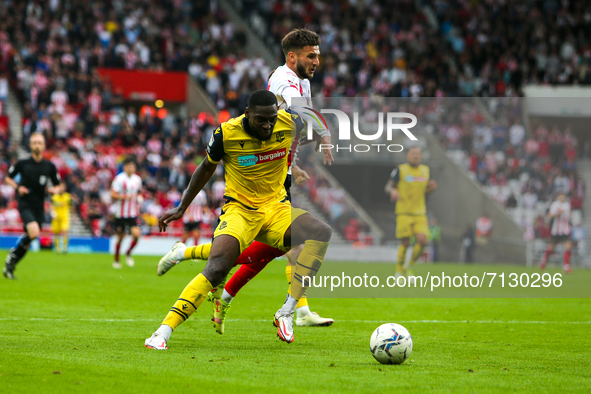 Sunderland's Leon Dajaku tries to go past Bolton Wanderer's George Johnston during the Sky Bet League 1 match between Sunderland and Bolton...