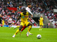 Sunderland's Leon Dajaku tries to go past Bolton Wanderer's George Johnston during the Sky Bet League 1 match between Sunderland and Bolton...