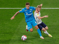 Danil Krugovoy (L) of Zenit and Sergey Piniaev of Krylia Sovetov vie for the ball during the Russian Premier League match between FC Zenit S...