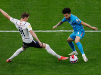 Claudinho (R) of Zenit and Roman Ezhov of Krylia Sovetov vie for the ball during the Russian Premier League match between FC Zenit Saint Pet...