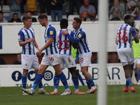 Hartlepool United's Luke Molyneux celebrates with his team mates after scoring their first goal during the Sky Bet League 2 match between Ha...