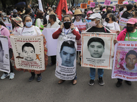 Mothers and fathers of the 43 missing students from Ayotzinapa, Guerrero, marched from the Angel of Independence to the Zócalo in Mexico Cit...
