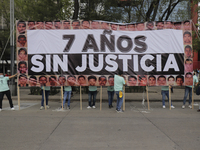 Partners of the 43 missing students from Ayotzinapa, Guerrero, march from the Angel of Independence to the Zócalo in Mexico City, to demand...