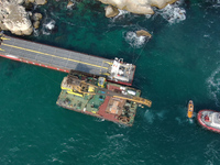 An aerial view of unsuccessful salvage operation of the cargo ship Vera Su which got stuck on at the rock black sea cost of the village of K...