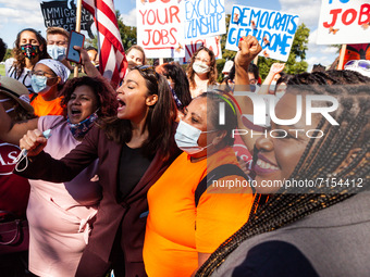 Immigrants and Dreamers chant with Congresswomen Alexandra Ocasio-Cortez (D-NY) and Cori Bush (D-MO) at a protest at the US Capitol, hosted...