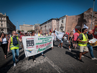 Workers of national airline Alitalia they take part in a protest in central Rome following a breakdown in recent days of negotiations with I...