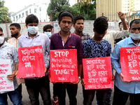Bangladesh Garments Workers Solidarity activists held a protest rally demanding stop harass garments workers in the name of Target in garmen...