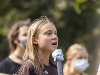 
The Swedish climate activist Greta Thunberg speaks during a Fridays for Future Student strike. The event took place during the Pre-COP Even...