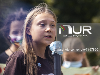 
The Swedish climate activist Greta Thunberg speaks during a Fridays for Future Student strike. The event took place during the Pre-COP Even...