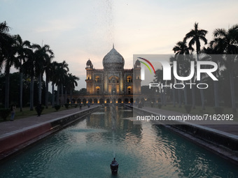 A view of Safdarjung Tomb, a sandstone and marble mausoleum built in 1754, during sunset in New Delhi, India on October 2, 2021. (