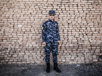 A police man keeps watch on the Citadel in Erbil / Summer 2013.  (