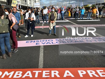 Activists from the teachers' union display banners in support of teachers' welfare demands during a march in Lisbon. 05 October 2021. The Po...