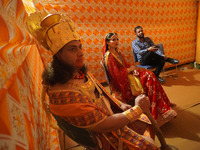 Artists wait backstage before the rehearsal of Ramlila, narrating the life of Hindu God Rama, ahead of Dussehra festival celebrations in New...