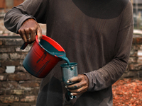 A man pour color on a spray machine to color leather pieces in Hazaribag, Dhaka, Bangladesh on October 06, 2021. Though many leather factori...