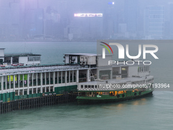  A star ferry moored in Tsim Sha Tsui as the Typhon Lionrock and heavy rains batter Victoria Harbour, in Hong Kong, China, on October 9, 202...