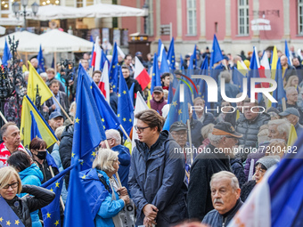 Protesters with EU and Polish flags are seen in Gdansk, Poland on 10 October 2021 People take to the streets around a country to voice oppos...