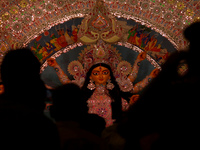 Hindu devotees visit a makeshift place of worship on the occasion of Durga Puja festival, amidst the coronavirus pandemic (COVID-19), in New...