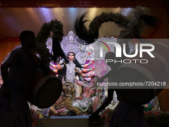 Indian traditional drum troupe (Dhaki) during the Durga Puja festival in Kolkata on October  11,2021. (