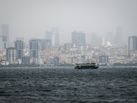 On 10 October, 2021, rain clouds hung over eastern Istanbul's skyscrapers and the Marmara Sea, bringing the fall season with cold temperatur...