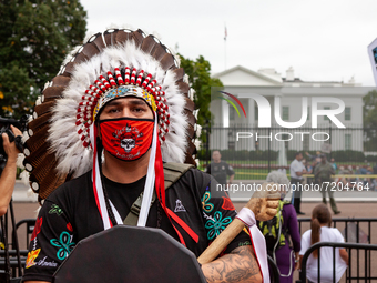 Roy Walks Through Hail takes a stand for water protectors and against oil and gas pipelines during a protest at the White House against the...