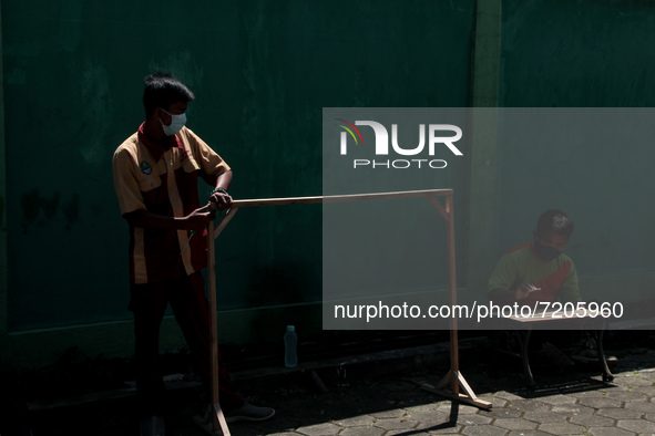 A students with a person disability attends a wood craft training  on 12 October, 2021 in Social Service of West Java Province, Cimahi, West...