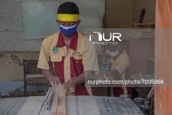 Students with a person disability attends a wood craft training  on 12 October, 2021 in Social Service of West Java Province, Cimahi, West J...