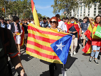A Catalan independentist has broken into the unionist demonstration on October 12, creating moments of confusion, on 12th october 2021, in B...