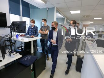 French Junior Minister for Digital Transition and Electronic Communication Cedric O watches a demonstration and tests the French company Wan...