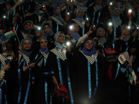 Palestinian students from al-Azhar University attend their graduation ceremony, in Gaza city on October 12, 2021.  (