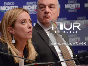 Giorgia Meloni, behind Enrico Michetti during the News Center-right leaders united for Enrico Michetti. on October 13, 2021 at the Hadrian&#...