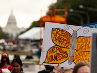 Native American climate activists and allies depart Freedom Plaza en route to the White House to protest against the continued use of fossil...