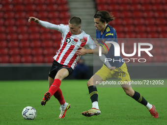 Will Harris of Sunderland and Alvaro Fernandez of Manchester United in action during the EFL Trophy match between Sunderland and Manchester...