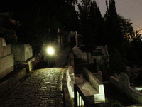 From people passing through the Eyüp Cemetery in the evening in Istanbul, Turkey on October 13, 2021. (