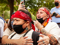 A trio of Native American climate activists voice their grief and anger over the killings of children at residential schools during a non-vi...