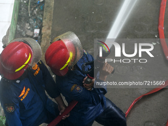Firefighters carry out an exercise in handling and assisting a high-rise building fire in Palu, Central Sulawesi Province, Indonesia, Thursd...