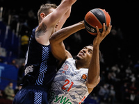 Andrey Zubkov of Zenit and Augustine Rubit #21 of Bayern in action during the EuroLeague Basketball match between Zenit St. Petersburg and F...