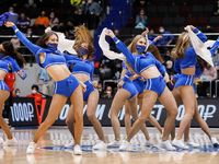 Zenit cheerleaders dance on the court with their protective masks on during the EuroLeague Basketball match between Zenit St. Petersburg and...